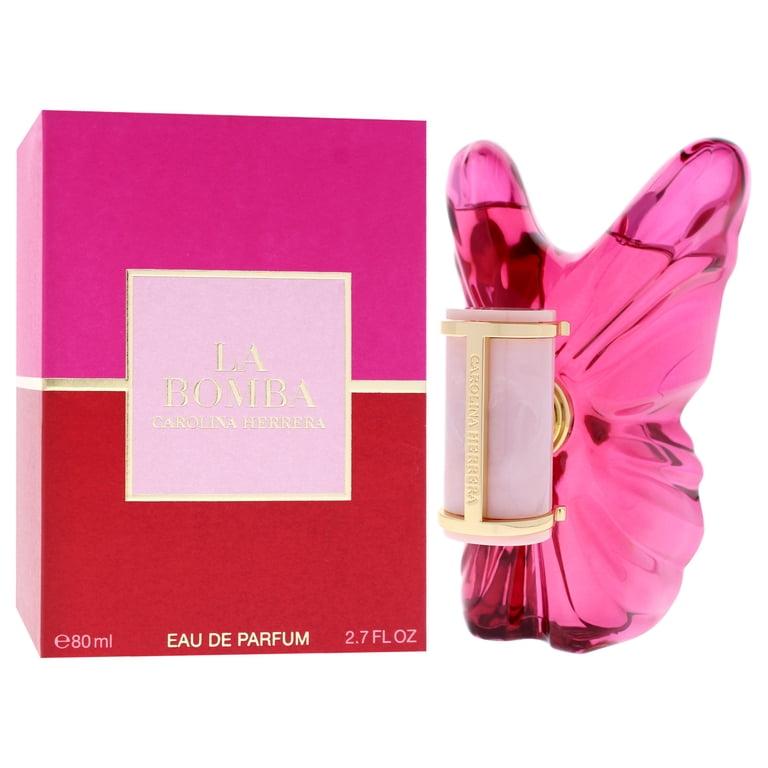 Pink butterfly-shaped perfume bottle with matching box on a white background